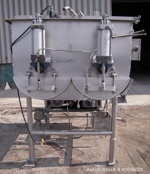 Used Mepaco Twin Shaft Ribbon Mixer. Approximately 116 cubic feet and 2000 pound capacity, 304 stainless steel. Non- jacketed trough approximately 84" long x 52" wide x 32" deep. (2) 3 1/2" diameter ...