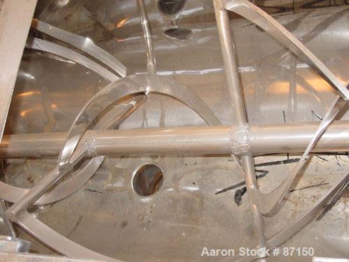 Used Double Spiral Ribbon Blender, 36 Cubic Feet Working Capacity, Stainless Steel. Non-jacketed trough 30" wide x 78" long x approximately 34" deep. 3" diameter shaft, inner ribbon 2" wide x 1/4" th...
