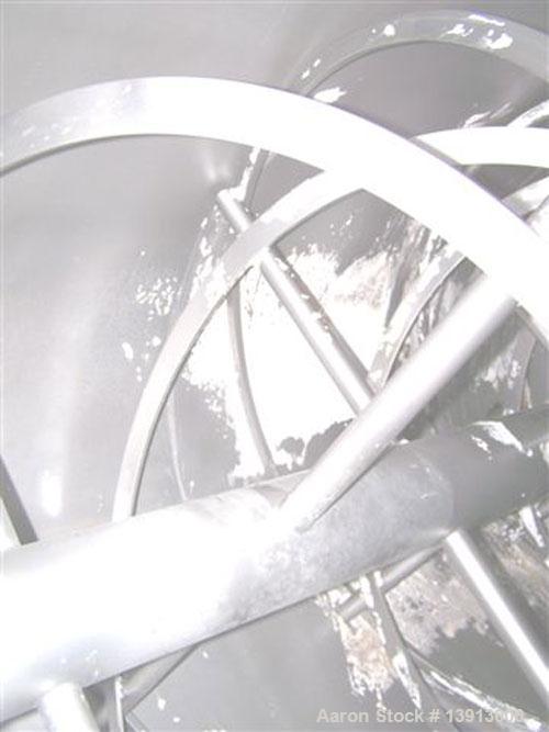 Used Hayes & Stolz Double Ribbon Blender. Manufactured 1998. 196 cubic foot, food grade stainless steel, 40 hp drive, 10 rpm at ribbon, covered top with (2) 7" and (2) 25" square inlets. Approximatel...
