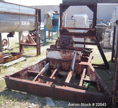 Used Ribbon Blender, 143 Cubic Feet, 304 Stainless Steel. Non-jacketed trough 44" wide x 144" long x approximately 59" deep. 4" diameter stainless steel clad shaft with partial ribbons and posts. 1 p...