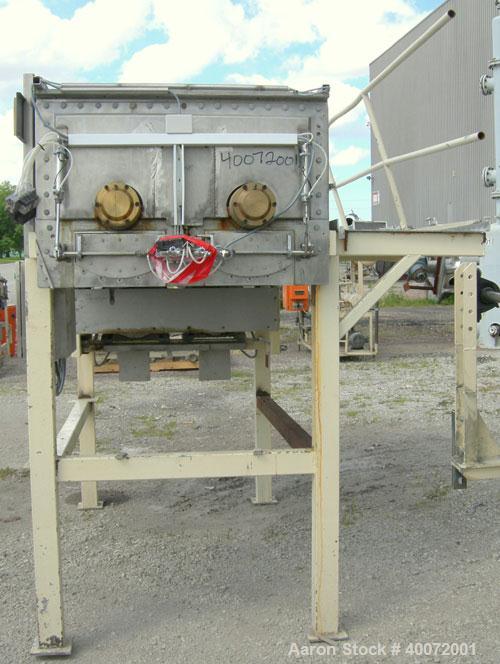 Used Twin Shaft Ribbon Mixer, Approximately 41 Cubic Foot Capacity, 304 Stainless Steel.  304 stainless steel jacketed trough 40" wide x 51" long x approximately 17" deep, no rating.  (2) 3 1/4" diam...