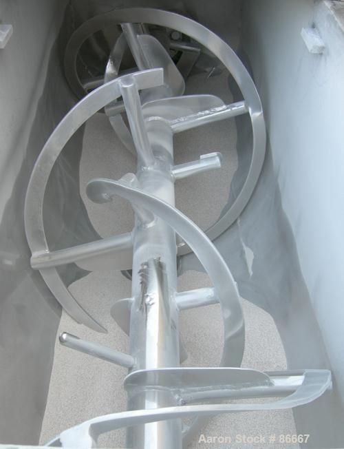 USED: Patterson Foundry Machine double spiral ribbon blender, 19.5 cubic foot working capacity, 304 stainless steel. Carbon steel jacketed trough 24" wide x 66" long x approximately 29" deep, rated 8...