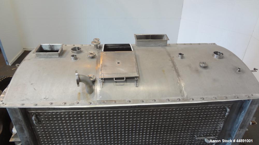 Used Mueller Double Spiral Ribbon Blender, 220 cubic feet working capacity, 304 stainless steel.  304 Stainless steel non-code dimple jacketed trough 60" wide x 129" long x approximately 60" deep, ra...