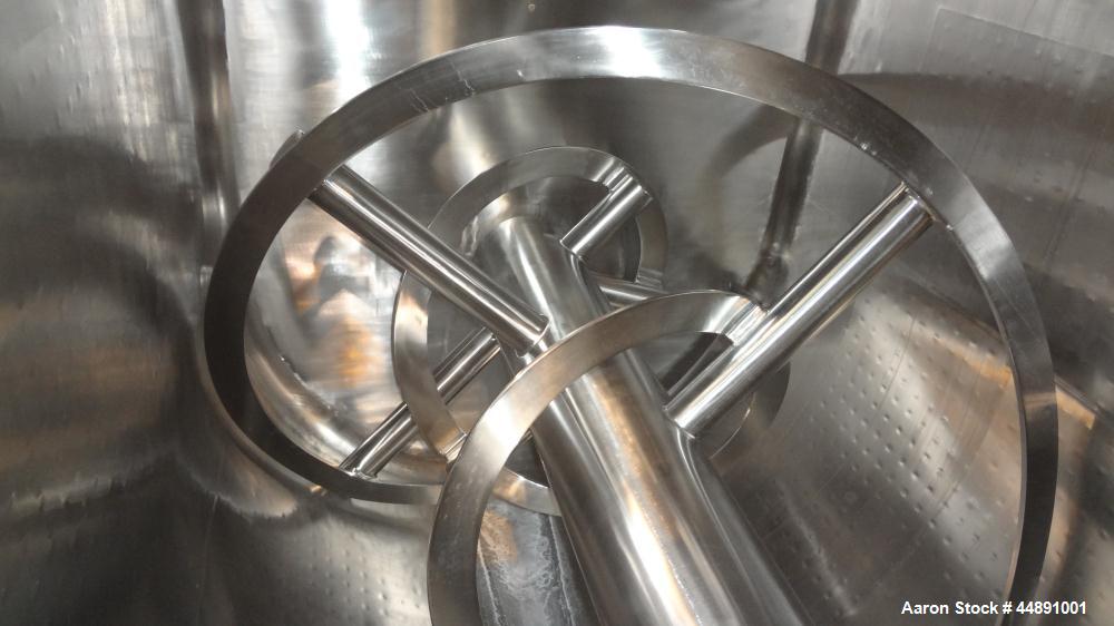 Used Mueller Double Spiral Ribbon Blender, 220 cubic feet working capacity, 304 stainless steel.  304 Stainless steel non-code dimple jacketed trough 60" wide x 129" long x approximately 60" deep, ra...