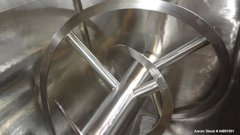Used Mueller Double Spiral Ribbon Blender, 220 cubic feet working capacity, 304 stainless steel.  304 Stainless steel non-code dimple jacketed trough 60" wide x 129" long x approximately 60" deep, ra...