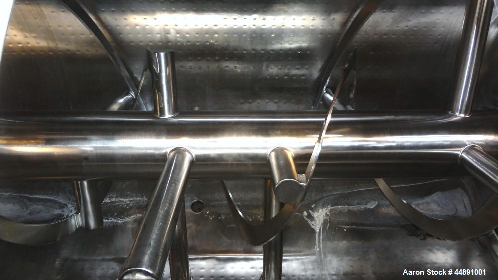 Used Mueller Double Spiral Ribbon Blender, 220 cubic feet working capacity, 304 stainless steel.  304 Stainless steel non-code dimple jacketed trough 60" wide x 129" long x approximately 60" deep, ra...
