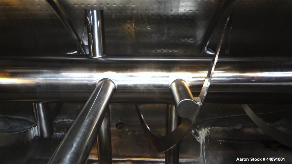 Used Mueller Double Spiral Ribbon Blender, 220 cubic feet working capacity, 304 stainless steel.  304 Stainless steel non-code dimple jacketed trough 60" wide x 129" long x approximately 60" deep, ra...