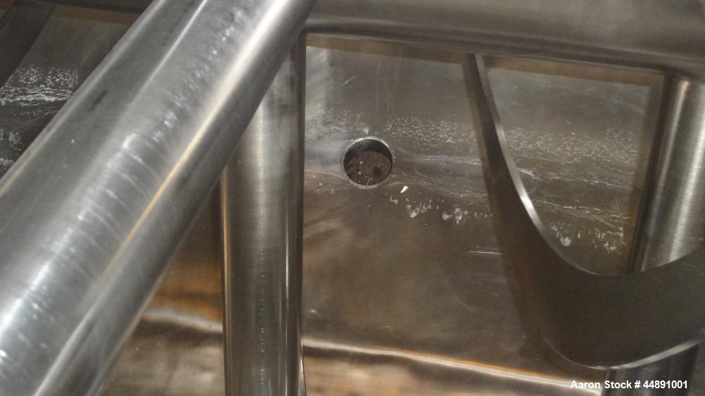 Used Mueller Double Spiral Ribbon Blender, 220 cubic feet working capacity, 304 stainless steel.  304 Stainless steel non-code dimple jacketed trough 60" wide x 129" long x approximately 60" deep, ra...
