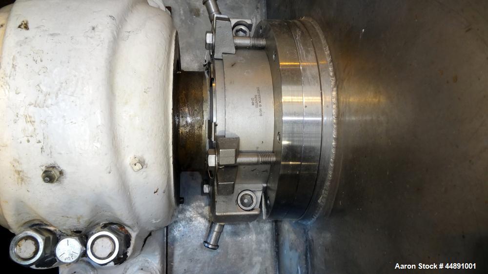Used Mueller Double Spiral Ribbon Blender, 220 cubic feet working capacity, 304 stainless steel.  304 Stainless steel non-code dimple jacketed trough 60" wide x 129" long x approximately 60" deep, ra...