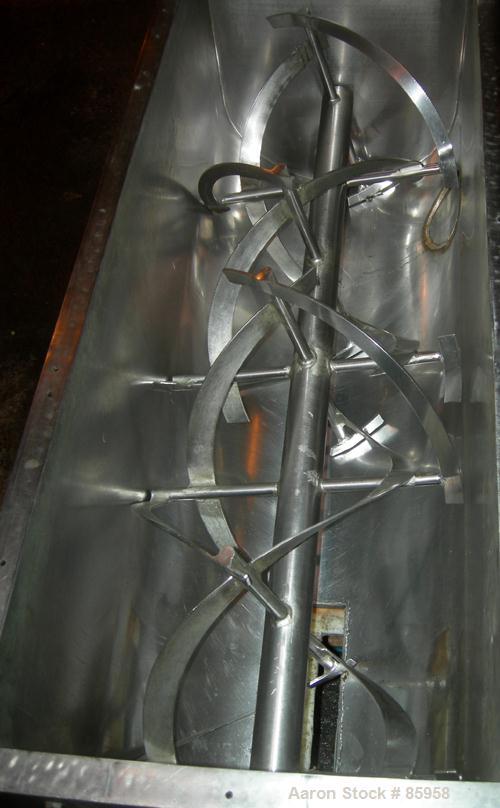 USED: Paul O Abbe double spiral ribbon blender, 8.3 cubic feet working capacity, 304 stainless steel. Non-jacketed trough 50" long x 18" wide x approximately 22" deep. 2-1/2" diameter shaft. Inner ri...
