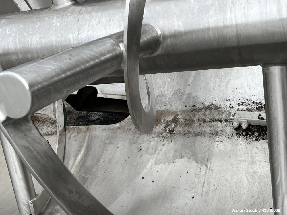 Used 316 Stainless Steel Double Spiral Ribbon Blender. Approximate 270 Cubic Foot working capacity. Non-Jacketed trough approximately 144" L x 60" W x 66" Deep. Open top, no cover. Approximate 10" di...