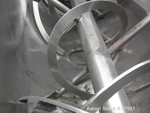 Used Robinson Double Spiral Ribbon Blender, Size 7, 44 Cubic Feet Working Capacity, Carbon Steel. Jacketed trough 30" wide x 96" long x approximately 35" deep, no rating. 5" diameter shaft, inner rib...