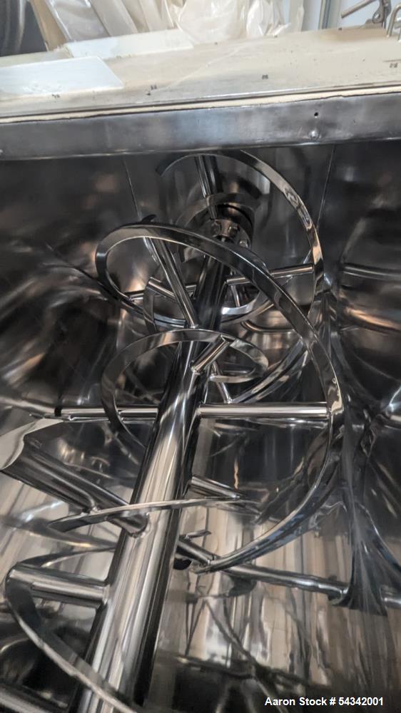 Used Ross approximately 52 cuft stainless steel double ribbon blender.  Sanitary Construction.  Approximately 36" wide X 84" long.  Center bottom discharge. Approximately 20 hp 3 phase 60 cycle 230/4...