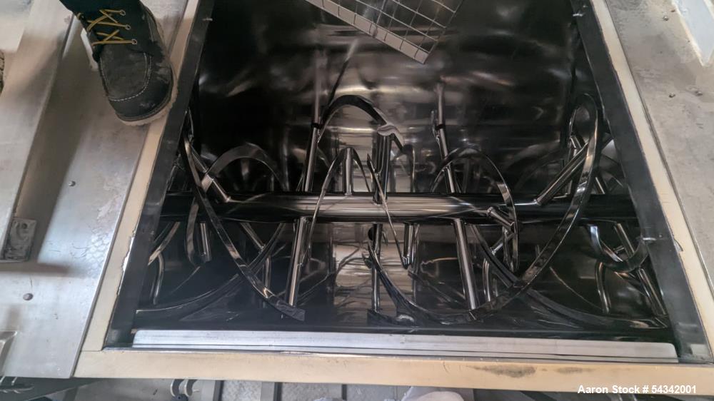 Used Ross approximately 52 cuft stainless steel double ribbon blender.  Sanitary Construction.  Approximately 36" wide X 84" long.  Center bottom discharge. Approximately 20 hp 3 phase 60 cycle 230/4...