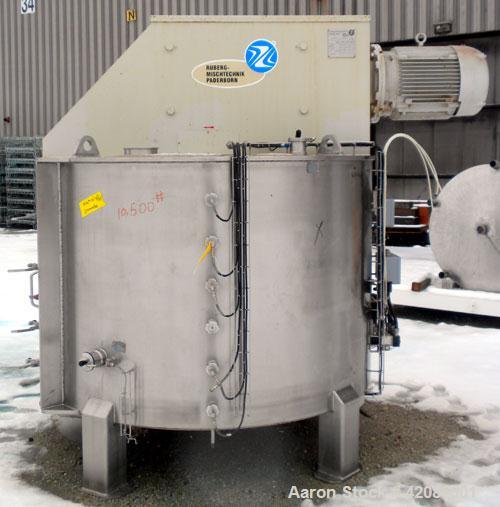 Used Ruberg Vertical Single Shaft Mixer, 88.3 cubic feet (25-2500 liter), model VM2500, 316L stainless steel. Non-jacketed chamber approximately 74" diameter x 50" deep, flat top and bottom. 6" diame...