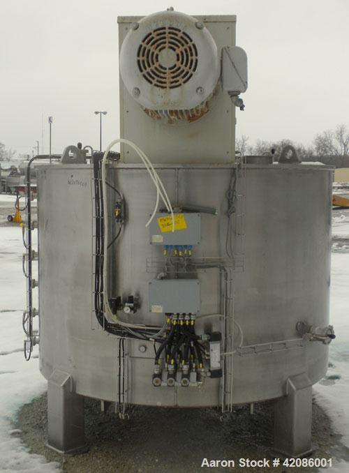 Used Ruberg Vertical Single Shaft Mixer, 88.3 cubic feet (25-2500 liter), model VM2500, 316L stainless steel. Non-jacketed chamber approximately 74" diameter x 50" deep, flat top and bottom. 6" diame...