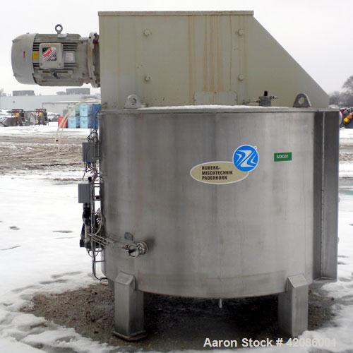 Used Ruberg Vertical Single Shaft Mixer, 88.3 cubic feet (25-2500 liter), model VM2500, 316L stainless steel. Non-jacketed chamber approximately 74" diameter x 50" deep, flat top and bottom. 6" diame...
