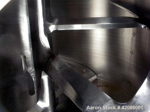 Used Ruberg Vertical Single Shaft Mixer, 88.3 cubic feet (25-2500 liter), model VM2500, 316L stainless steel. Non-jacketed chamber approximately 74" diameter x 50" deep, flat top and bottom. 6" diame...