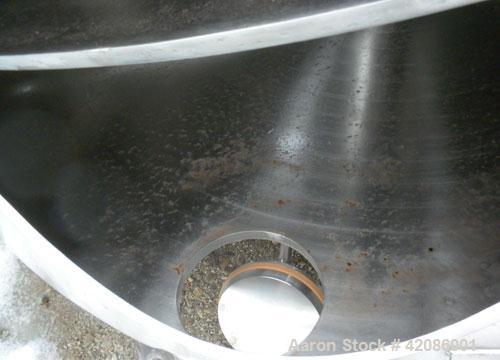 Used Ruberg Vertical Single Shaft Mixer, 88.3 cubic feet (25-2500 liter), model VM2500, 316L stainless steel. Non-jacketed chamber approximately 74" diameter x 50" deep, flat top and bottom. 6" diame...