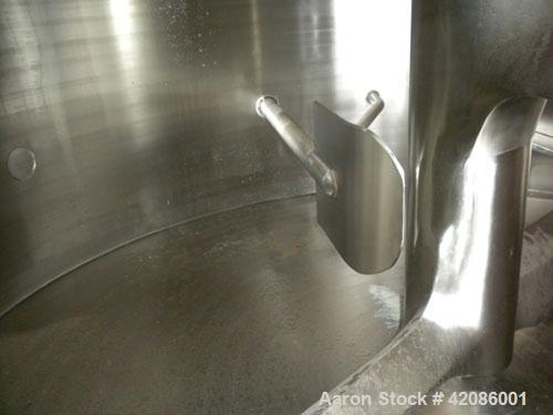 Used Ruberg Vertical Single Shaft Mixer, 88.3 cubic feet (25-2500 liter), model VM2500, 316L stainless steel. Non-jacketed chamber approximately 74" diameter x 50" deep, flat top and bottom. 6" diame...