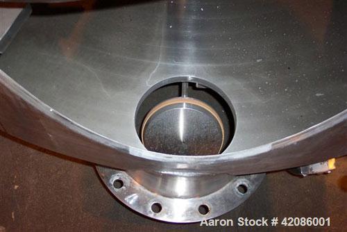 Used Ruberg Vertical Single Shaft Mixer, 88.3 cubic feet (25-2500 liter), model VM2500, 316L stainless steel. Non-jacketed chamber approximately 74" diameter x 50" deep, flat top and bottom. 6" diame...