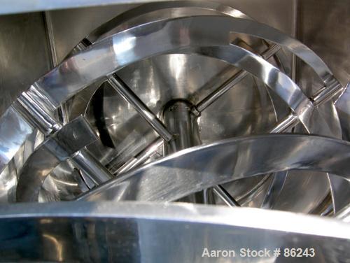 Used S Howes Double Spiral Ribbon Blender, Model S488, 113 Cubic Feet Working Capacity, 304 Stainless Steel. Non-jacketed trough 48" wide x 96" long x approximately 54" deep. 6" diameter shaft, inner...