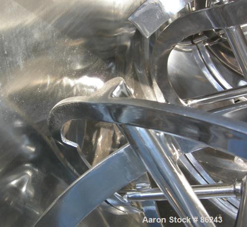 Used S Howes Double Spiral Ribbon Blender, Model S488, 113 Cubic Feet Working Capacity, 304 Stainless Steel. Non-jacketed trough 48" wide x 96" long x approximately 54" deep. 6" diameter shaft, inner...