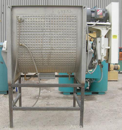 Used Scott Equipment Co double spiral ribbon blender, approximately 56 cubic feet working capacity, 304 stainless steel. Dimpled jacketed trough 48" wide x 54" long x approximately 54" deep, rated 30...
