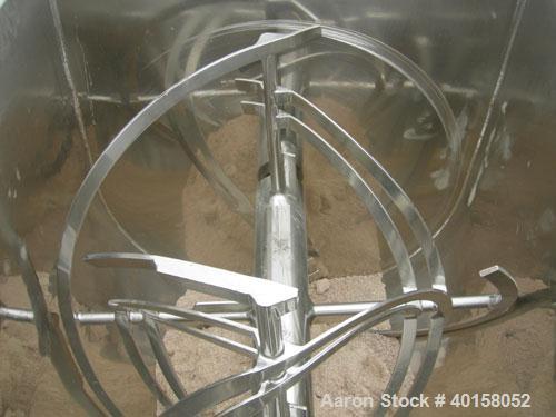 Used Scott Equipment Co double spiral ribbon blender, approximately 56 cubic feet working capacity, 304 stainless steel. Dimpled jacketed trough 48" wide x 54" long x approximately 54" deep, rated 30...