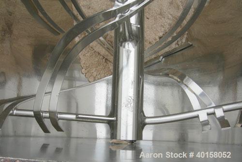 Used Scott Equipment Co double spiral ribbon blender, approximately 56 cubic feet working capacity, 304 stainless steel. Dimpled jacketed trough 48" wide x 54" long x approximately 54" deep, rated 30...