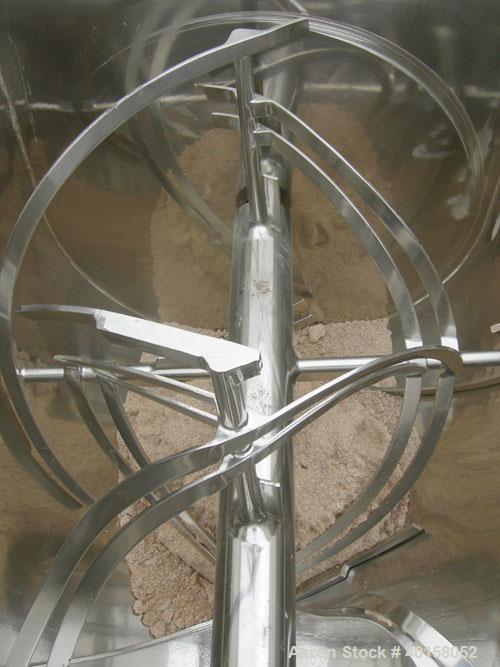 Used Scott Equipment Co double spiral ribbon blender, approximately 56 cubic feet working capacity, 304 stainless steel. Dimpled jacketed trough 48" wide x 54" long x approximately 54" deep, rated 30...