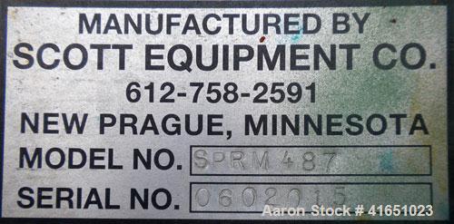 Used Scott Equipment Paddle/Ribbon Blender, model SPRM487, 99 cubic feet working capacity, carbon steel. Non-jacketed trough 48" wide x 84" long x approximately 52" deep. 7" diameter shaft. Single ri...