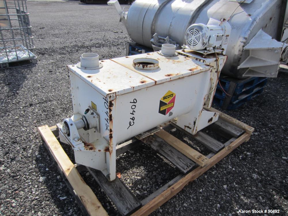 Used Scott Equipment Company Double Spiral Ribbon Blender, Model SRM183, 6 Cubic Feet, Carbon Steel. Non-jacketed trough 18" wide x 36" long x approximately 20" deep. 2-1/2" diameter shaft, inner rib...