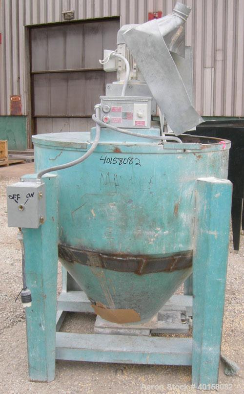 Used- Universal Dynamics Vertical Ribbon Mixer, approximately 26 cubic feet, model 65-2000, carbon steel. 48" diameter x 22"...