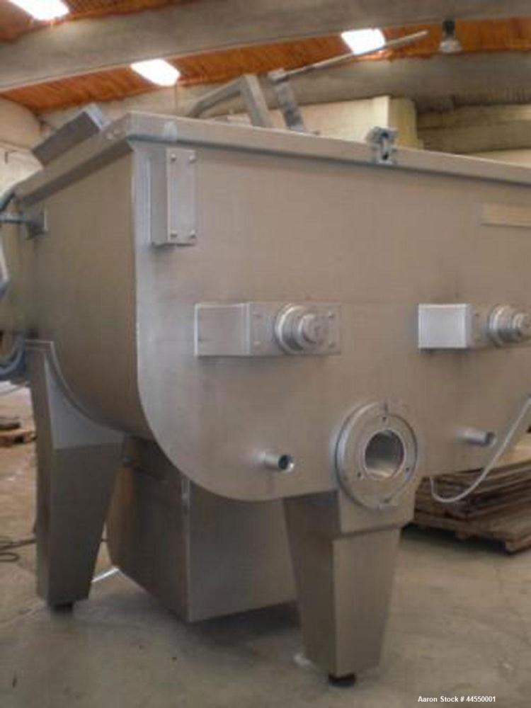 Used Wolfking Model TSMG 2500-250 Twin Shaft Grinder-Mixer.  Capacity 88 cubic feet (2500 liters).  Unit dimensions: 11.4' x 5.5' x 6.4' (3480mm x 1692mm x 1952mm).  Comprised of: One mixer section, ...