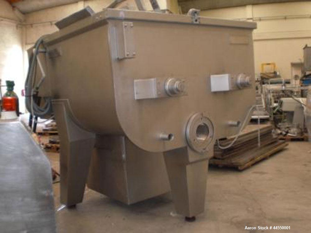Used Wolfking Model TSMG 2500-250 Twin Shaft Grinder-Mixer.  Capacity 88 cubic feet (2500 liters).  Unit dimensions: 11.4' x 5.5' x 6.4' (3480mm x 1692mm x 1952mm).  Comprised of: One mixer section, ...