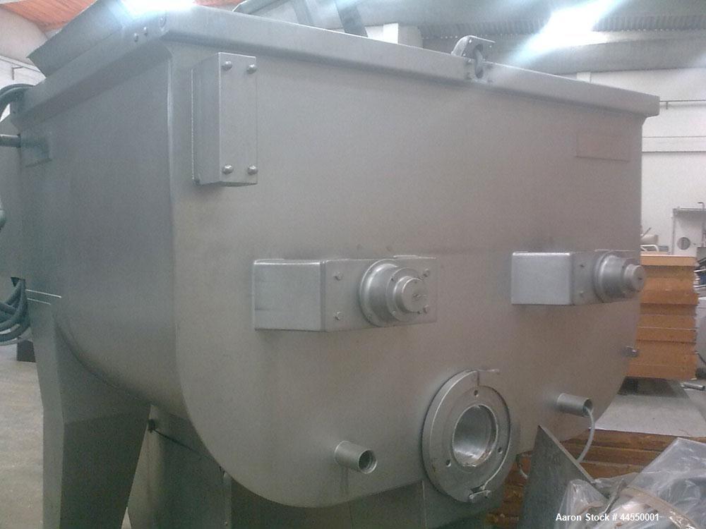 Used Wolfking Model TSMG 2500-250 Twin Shaft Grinder-Mixer.  Capacity 88 cubic feet (2500 liters).  Unit dimensions: 11.4' x 5.5' x 6.4' (3480mm x 1692mm x 1952mm).  Comprised of: One mixer section, ...
