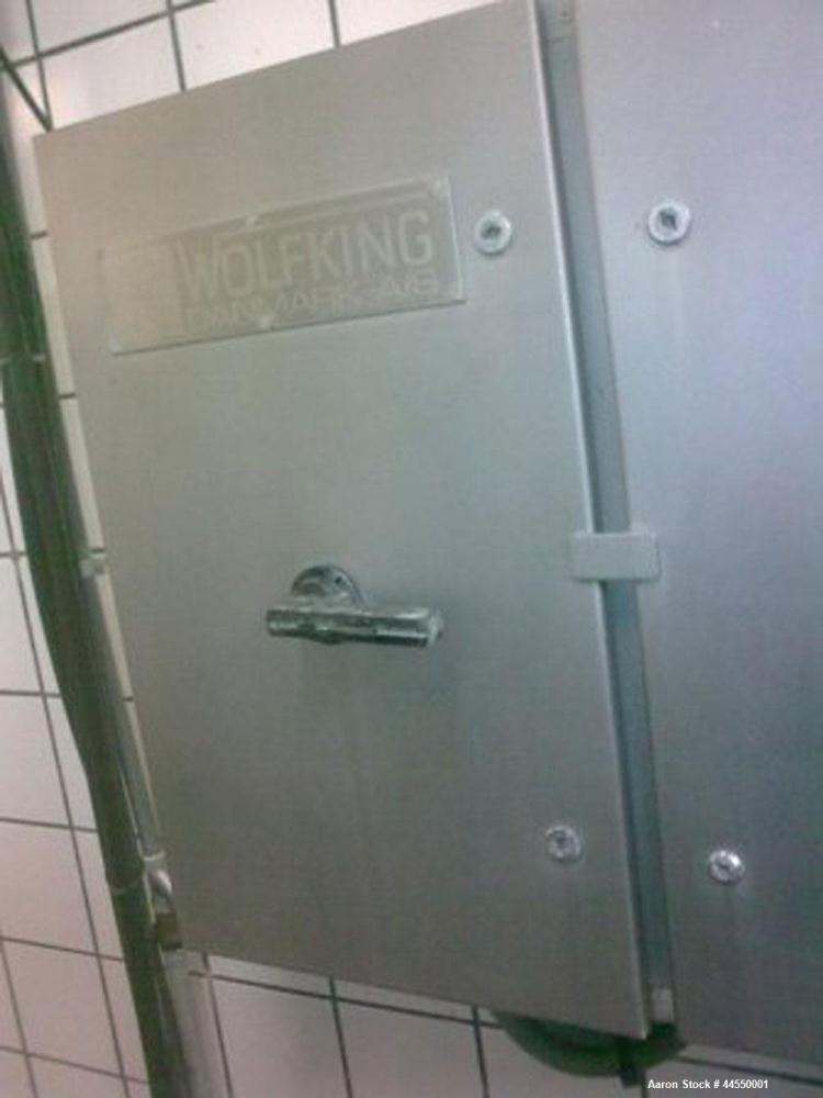 Used Wolfking Model TSMG 2500-250 Twin Shaft Grinder-Mixer.  Capacity 88 cubic feet (2500 liters).  Unit dimensions: 11.4' x 5.5' x 6.4' (3480mm x 1692mm x 1952mm).  Comprised of: One mixer section, ...