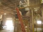 Used Double Ribbon Mixer. Approximately 320 cubic foot working capacity, chain driven by 30 hp motor. Has 12