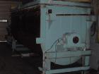 USED: 300 cubic foot single ribbon blender. Trough center bottomoutlet with pneumatic slide gate valve. Dimensions: 60