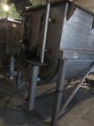 Used- 200 Cubic Foot Aaron Process Ribbon Blender. Sanitary stainless steel construction, approximately 60