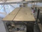 Used 200 Cubic Foot Aaron Process Ribbon Blender. Sanitary stainless steel construction, approximately 60