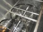 Used 200 Cubic Foot Aaron Process Ribbon Blender. Sanitary stainless steel construction, approximately 60