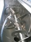 Used Aaron Process double spiral ribbon blender, 80 cubic feet working capacity, stainless steel. Non-jacketed trough 40