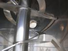 USED: Aaron Process double spiral ribbon blender, 80 cubic feet working capacity, 304 stainless steel. Non-jacketed trough 40
