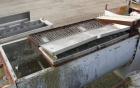 Used Babcock Gardner Interrupted Double Spiral Ribbon Blender, Model 2000H. 98 Cubic foot working capacity, 304 stainless steel. Non-jacketed trough 42