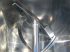 Used J.H. Day Double Spiral Ribbon Blender, model F, 54 cubic feet working capacity (59 total), 316 stainless steel. Jacketed trough 34