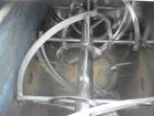 Used J.H. Day Double Spiral Ribbon Blender, 120 cubic feet working capacity. 304 stainless steel clad; carbon steel outside.  Non-jacketed trough 44