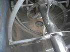 Used J.H. Day Double Spiral Ribbon Blender, 120 cubic feet working capacity. 304 stainless steel clad; carbon steel outside.  Non-jacketed trough 44