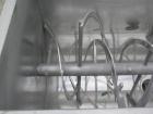 Used J.H. Day Double Spiral Ribbon Blender, 79 cubic root working capacity. 304 stainless steel clad; carbon steel outside.  Non-jacketed trough 40